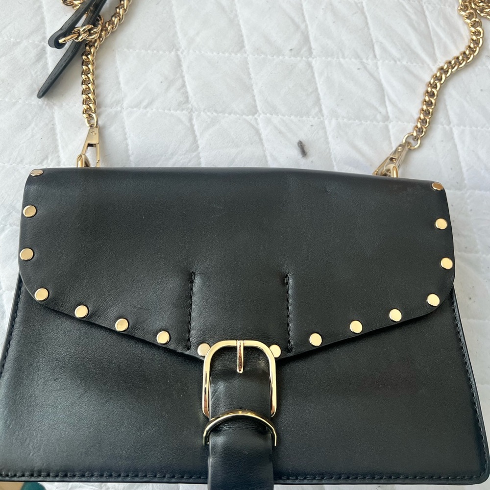 Rebecca Minkoff black bag with gold studs. Only wore once!